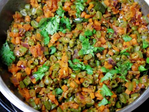 taste testing beans curry