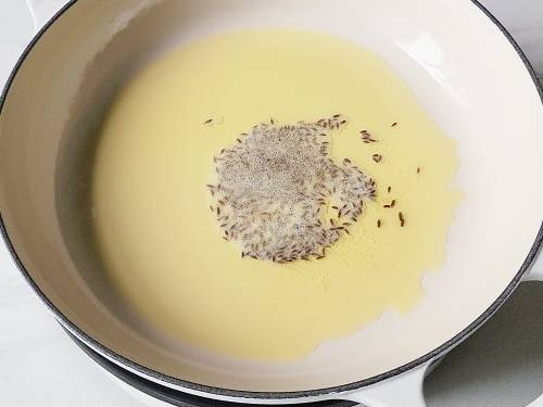 spluttering cumin seeds