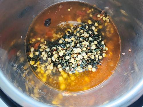 add dal and water to the pot