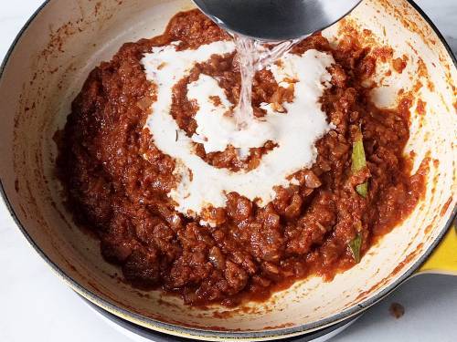 cooking mushroom curry with cashew cream