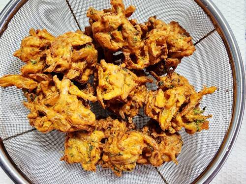 fried onion bhaji in a bowl