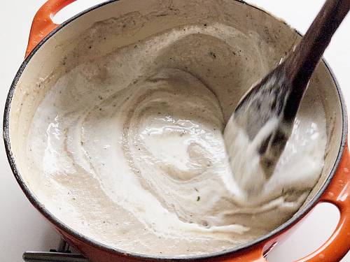 stirring in malai to curry