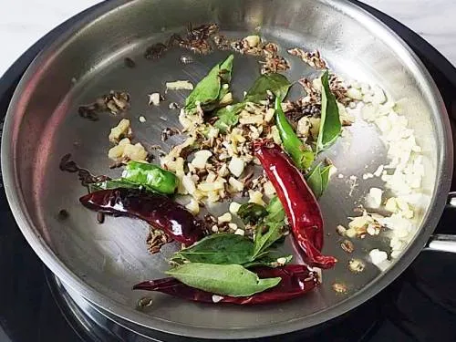 frying ginger garlic in ghee