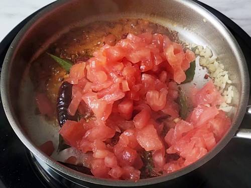 adding tomatoes