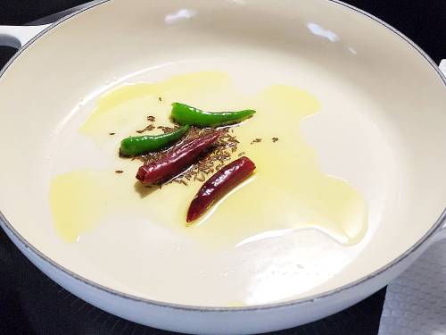 tempering chilies and cumin seeds