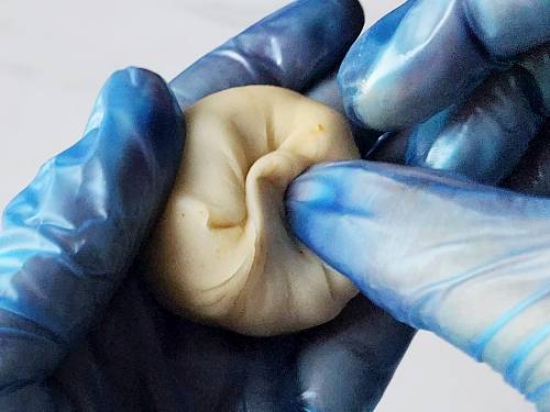 sealing the stuffed ball