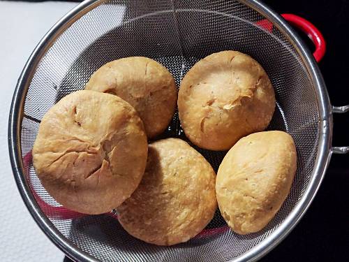 cooling them on a rack or colander