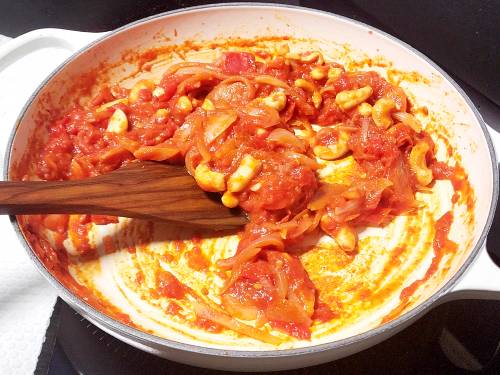 sauted onion tomatoes and cashews to make paneer butter masala
