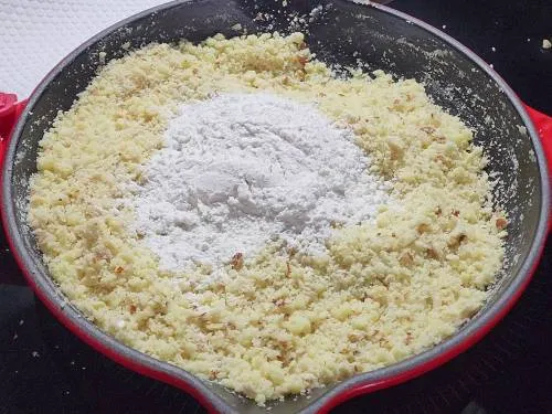 adding powdered sugar