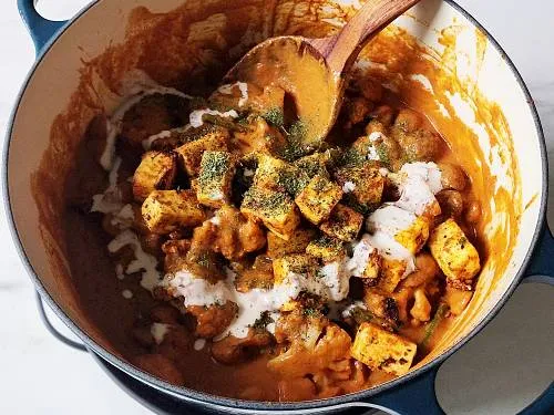 addition of kasuri, cream and paneer