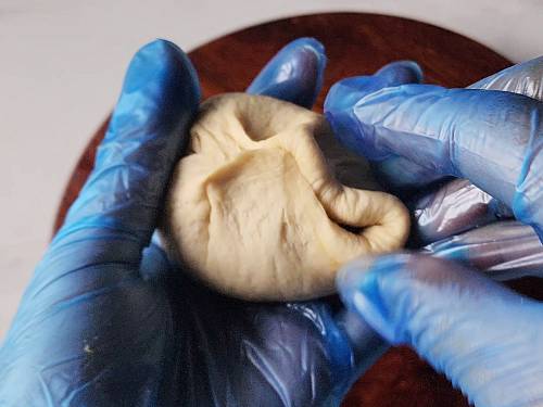 sealing the filling inside dough