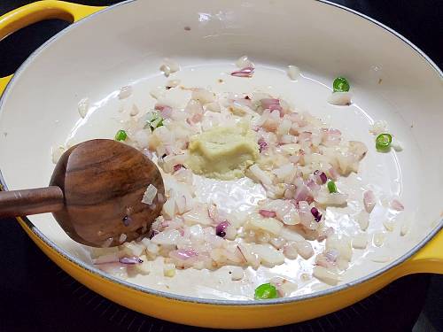 cooking onions in a pan