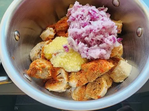 pulsed onion in a pot to cook