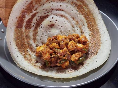 placing the paneer filling