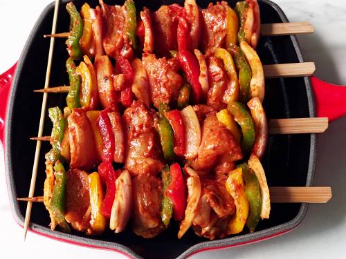 chicken threaded on skewers